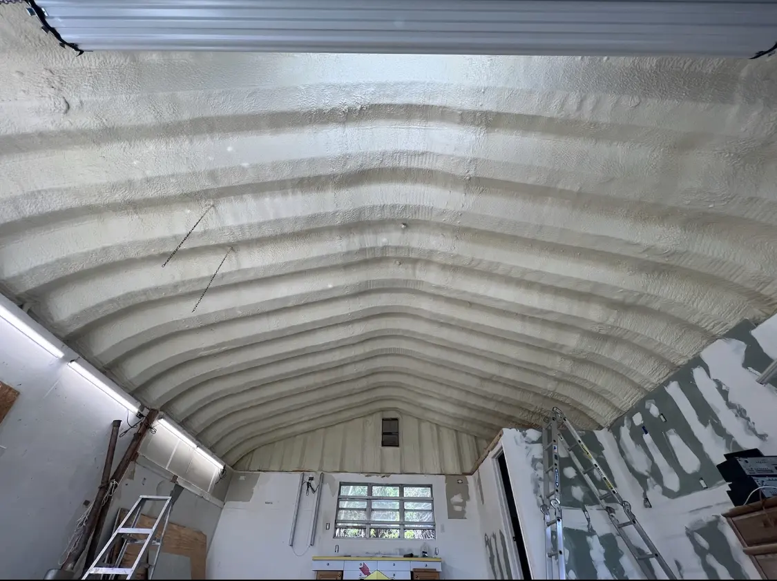 Spray polyurethane foam applied to the underside of a metal roof deck in Goodlettsville